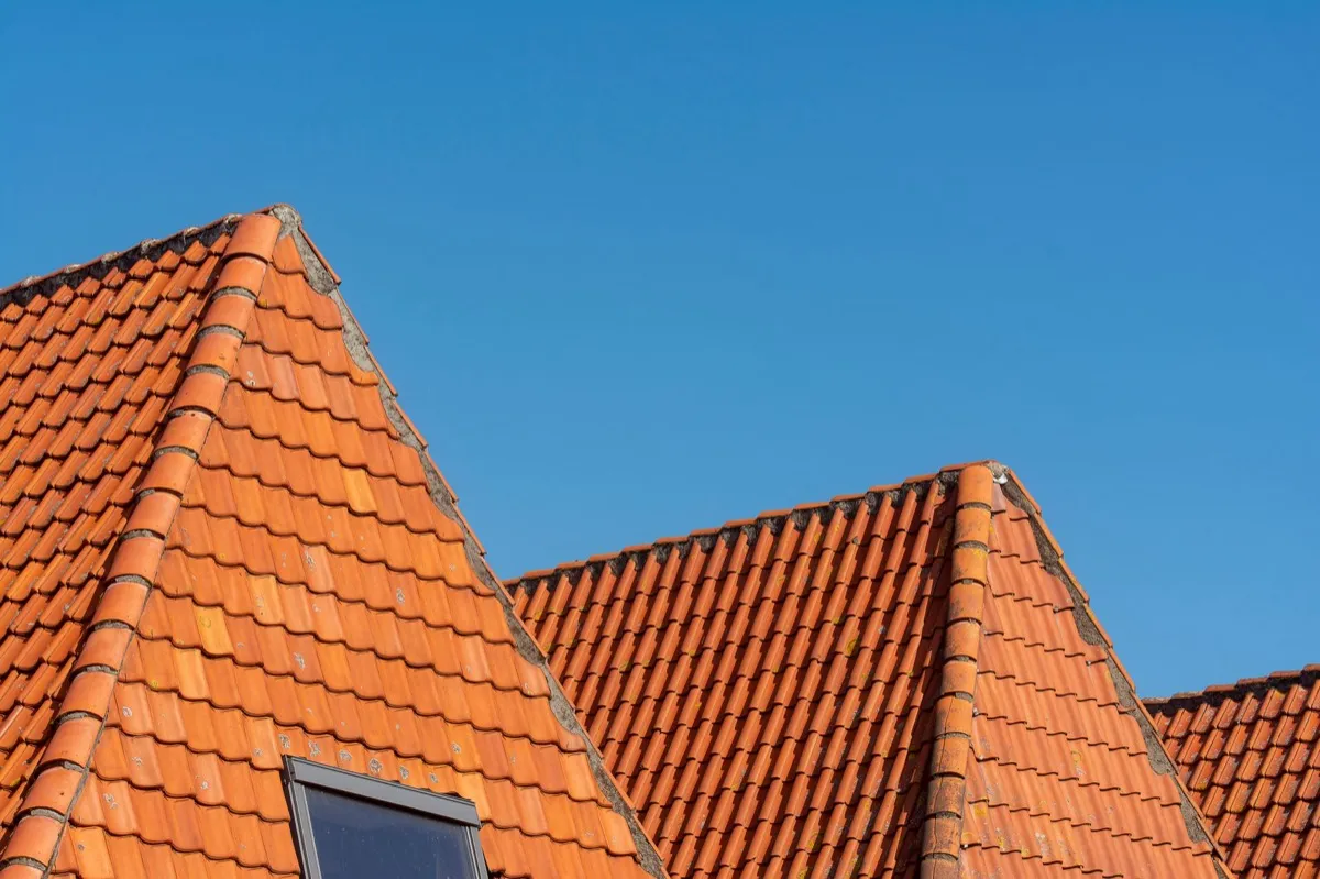 Clay barrel tile rooflines on homes in Gaithersburg, MD